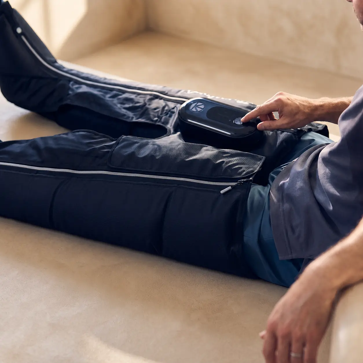 A guest relaxing in Pulsio compression boots