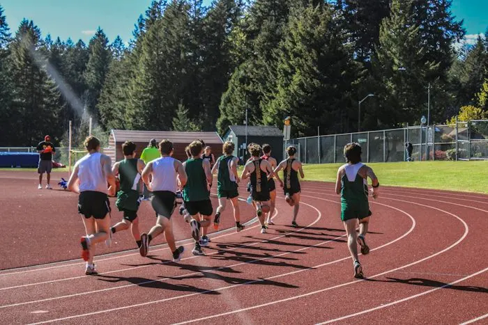 Athletes training on a running track