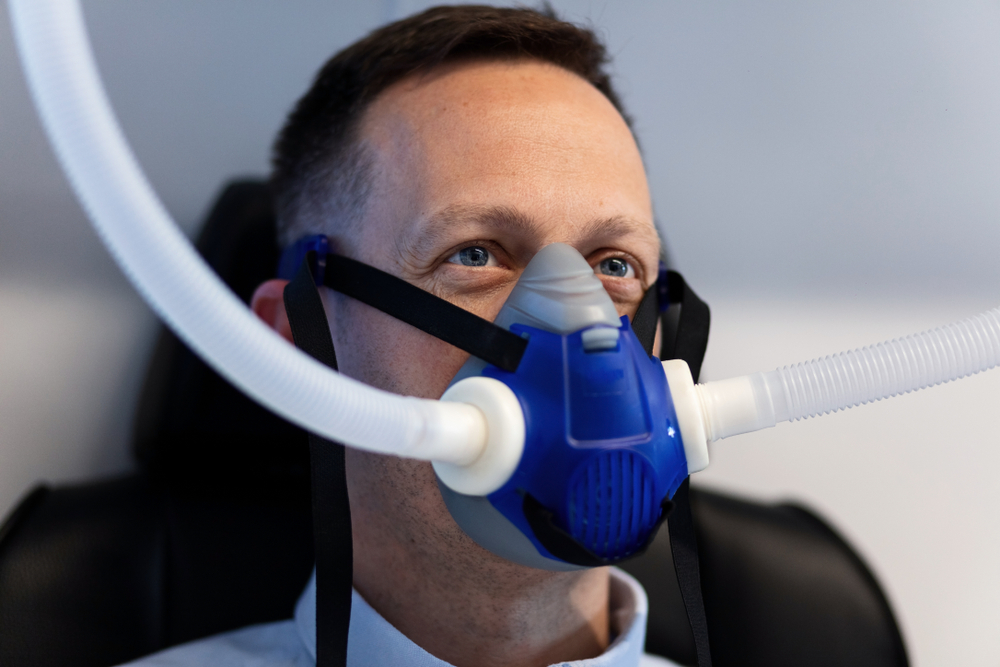 Client focused and alert while using an oxygen mask